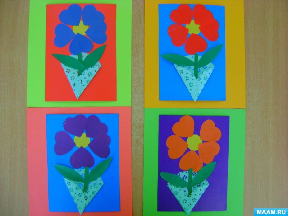Аплікація «Квітка з сердечок»   Ми з дітьми оформили листівку, яка може служити подарунком до свята 8 Березня